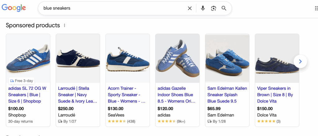 Search results for blue sneakers displaying shopping campaign sponsored product ads.